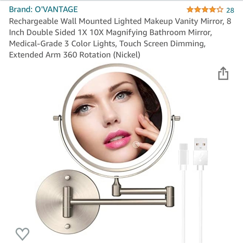 Vanity mirror- wall mounted.  10x magnification.  Lighted